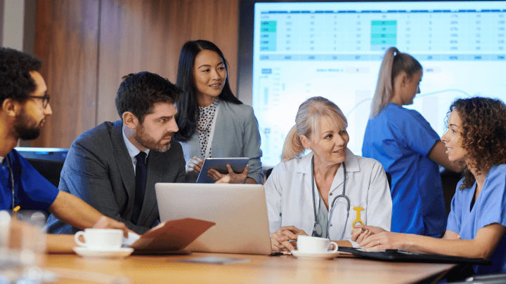 image os healthcare professionals discussing hospital workflow